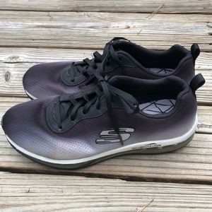 Sketchers women’s black size 9 athletic shoes.